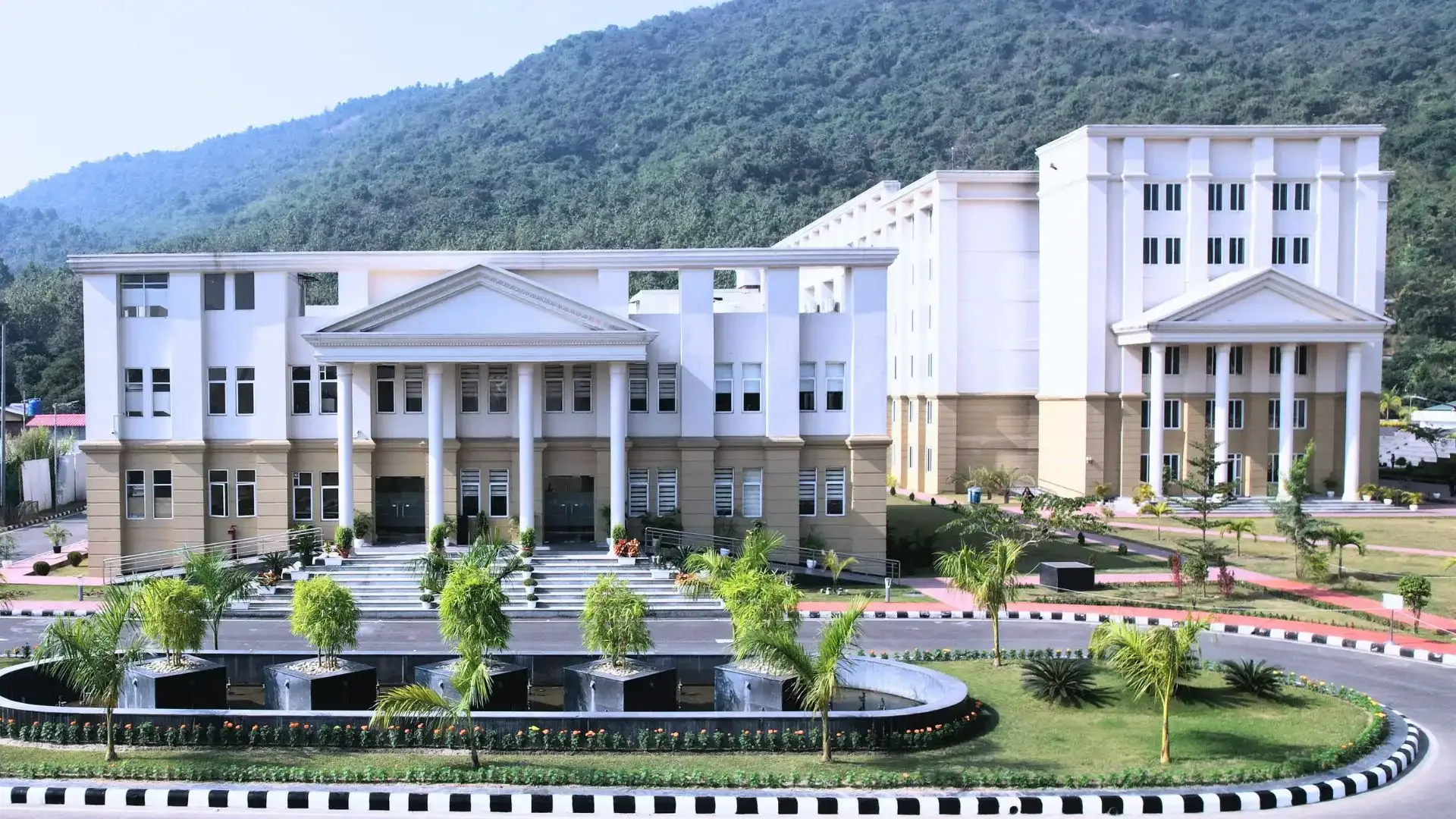 The Vandya International School academic block at Amingaon, Guwahati, below the forested hills